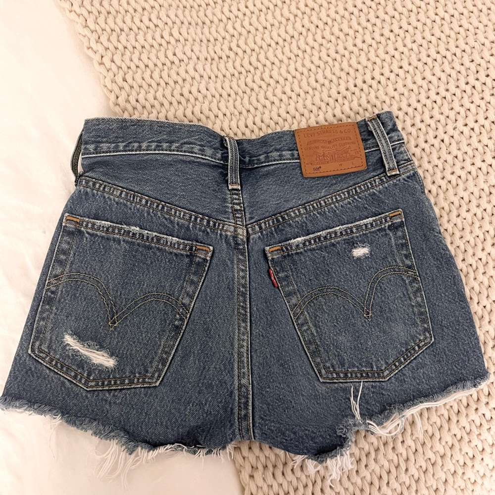 Levis High Rise Distressed Denim Shorts - Picture 3 of 9